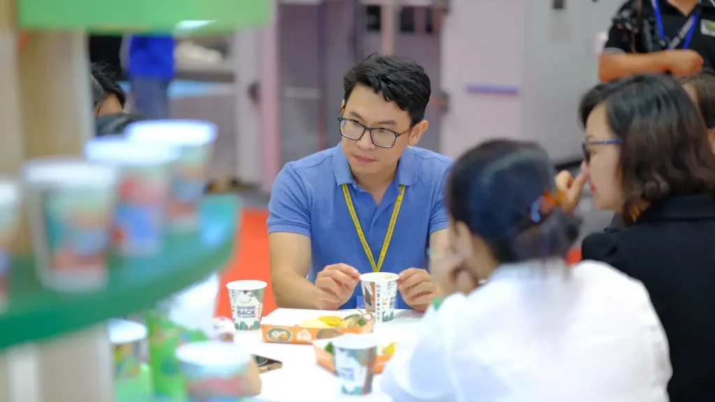 APP Group representative meets with visitors at Vietnam PrintPack 2025
